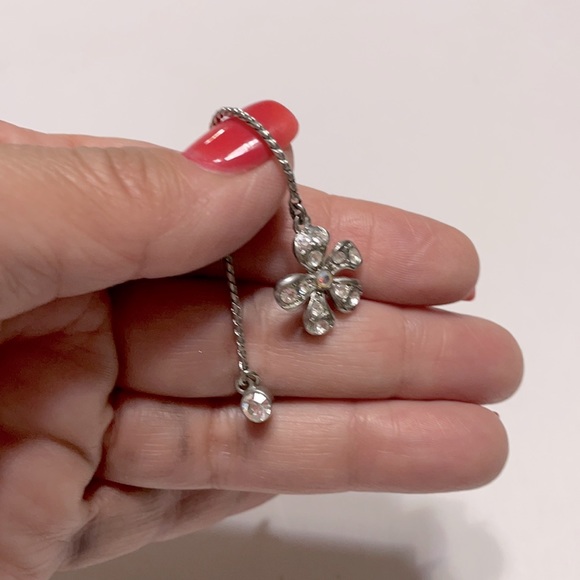 Fun dangle silver earrings with crystal flower. - Picture 2 of 2